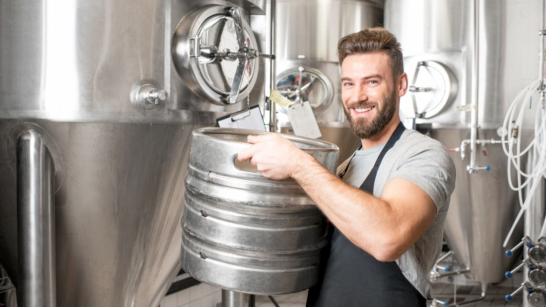 Picture of man lifting keg of beer